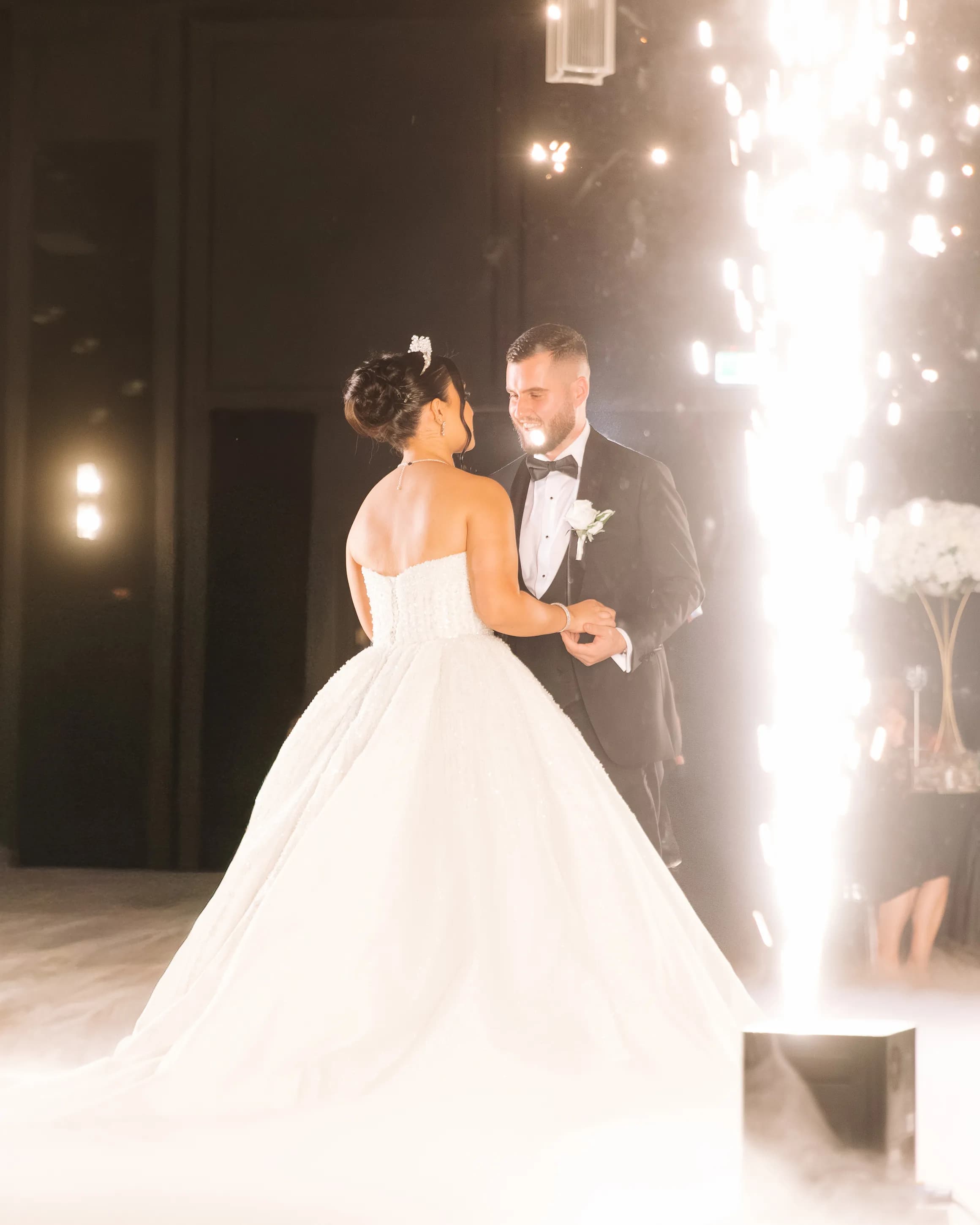 Black and white first dance moment captured with cinematic contrast by Studio HNR in Sydney